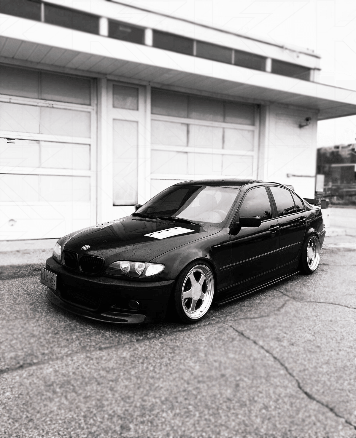 BMW E46 Series 3 drag wing-style trunk spoiler by K2 Industries, showing the sleek aerodynamic design on the car's rear.