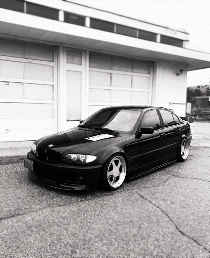 BMW E46 Series 3 drag wing-style trunk spoiler by K2 Industries, showing the sleek aerodynamic design on the car's rear.