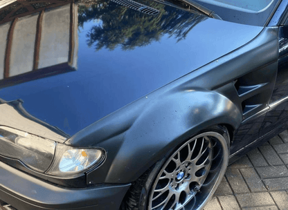 BMW E46 Touring Series 3 wide body kit by K2 Industries, featuring custom fenders and side skirts for 1997-2005 models.
