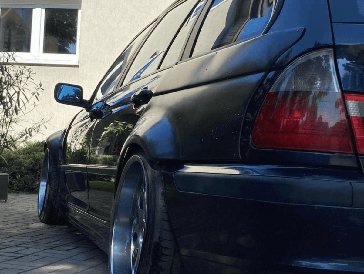 BMW E46 Touring Series 3 wide body kit by K2 Industries, featuring front and rear fender flares for a sporty look.