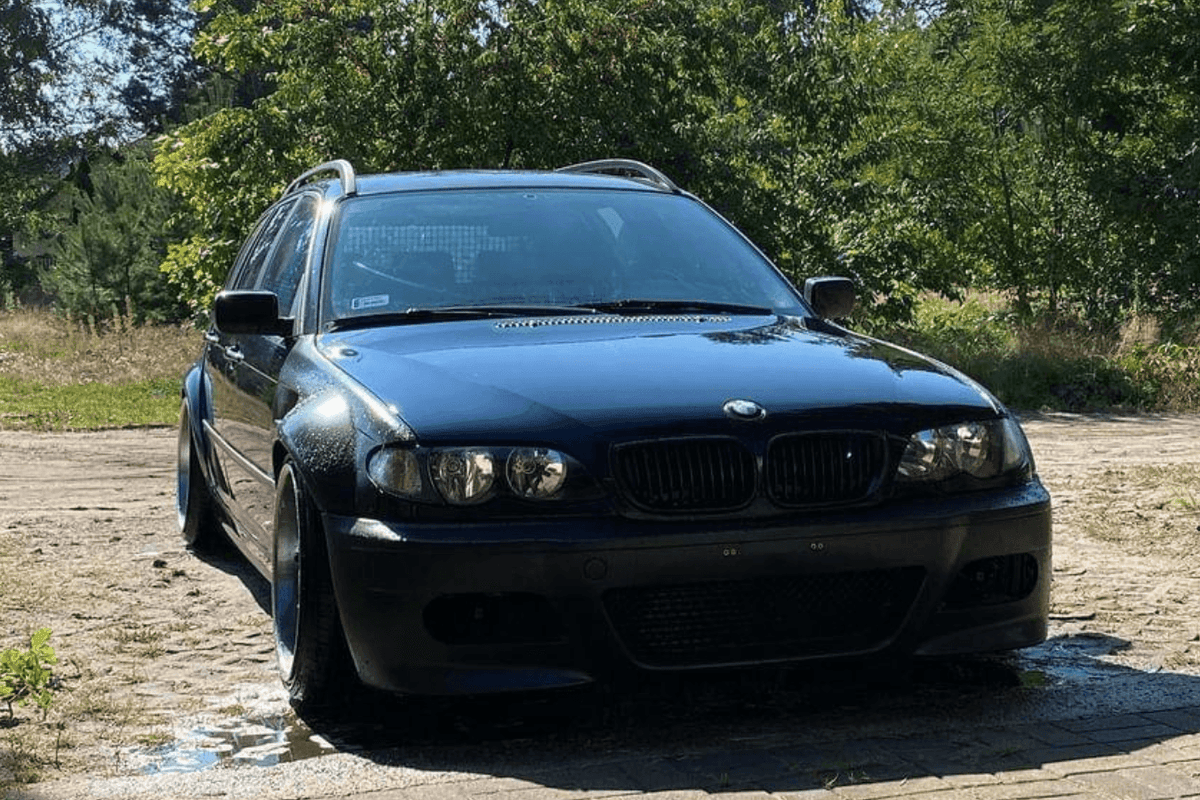 BMW E46 Touring Series 3 wide body kit by K2 Industries, showing front and side view of the custom body kit on the car.