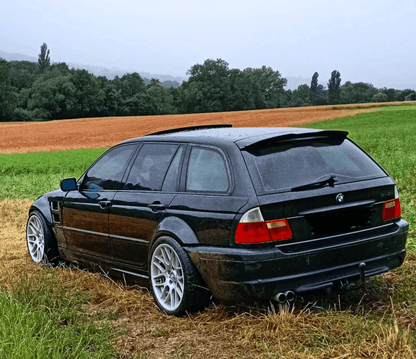 BMW E46 Touring Series 3 wide body kit by K2 Industries, showcasing side skirts, fenders, and front and rear bumper modifications.