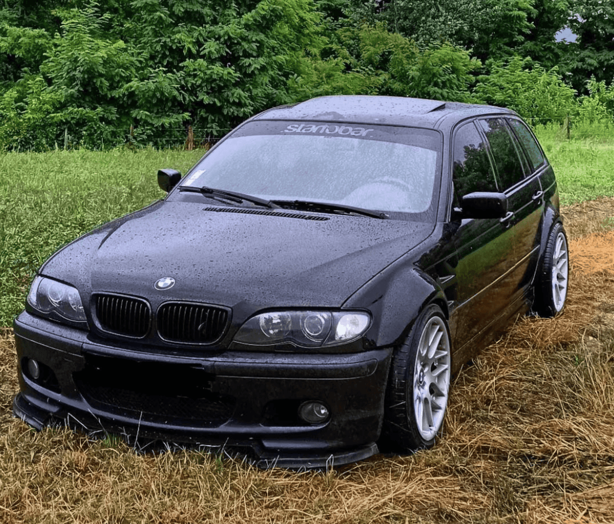 BMW E46 Touring Series 3 wide body kit by K2 Industries, front and side view, showing custom fenders and aerodynamic design.