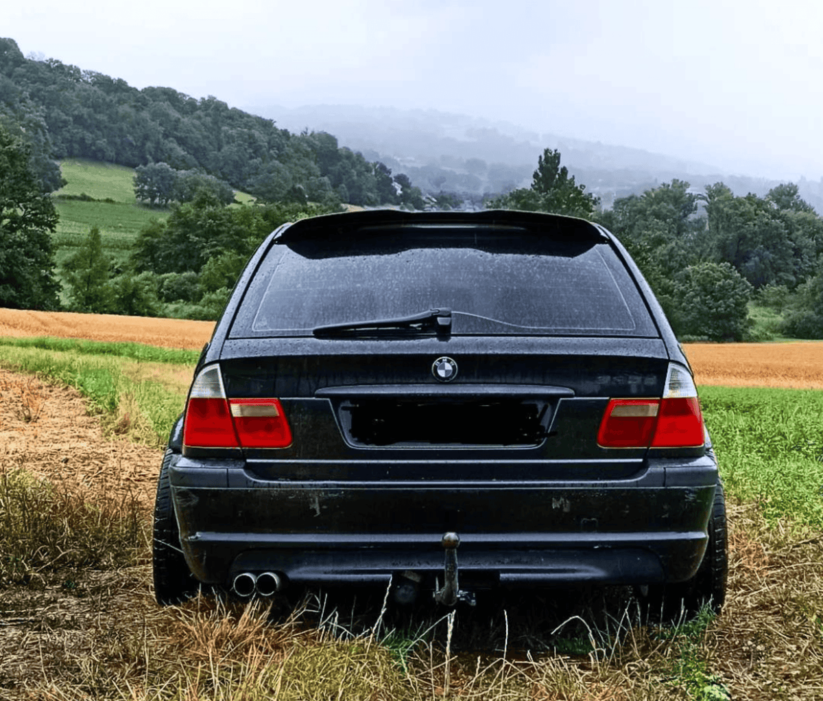 BMW E46 Touring Series 3 wide body kit by K2 Industries, showing front and side view of the customized exterior design.