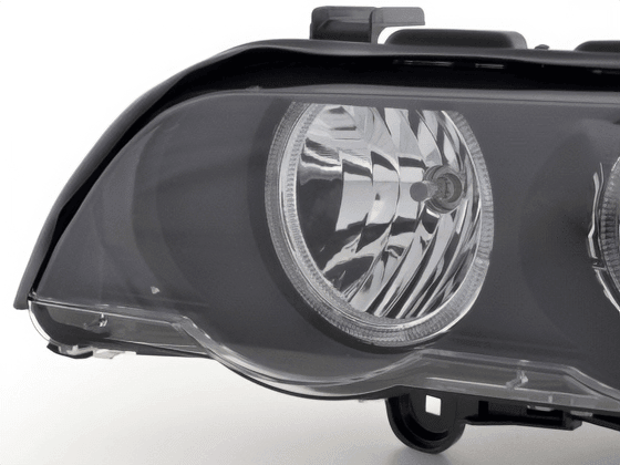 BMW E53 X5 black OE+ Angel Eye headlights by K2 Industries for 2000-2003 model, showing close-up of headlight assemblies.