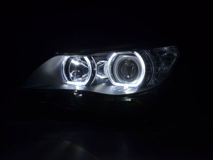 BMW E60 E61 5-Series LED headlights with OE+ Angel Eyes by K2 Industries, showing the bright LED rings on black headlight housings.