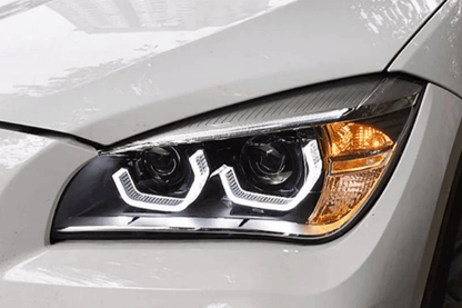 BMW E84 X1 headlights with modern angel eye design, HID Bi-Xenon bulbs, featuring sleek lighting for 2010-2015 models by K2 Industries.