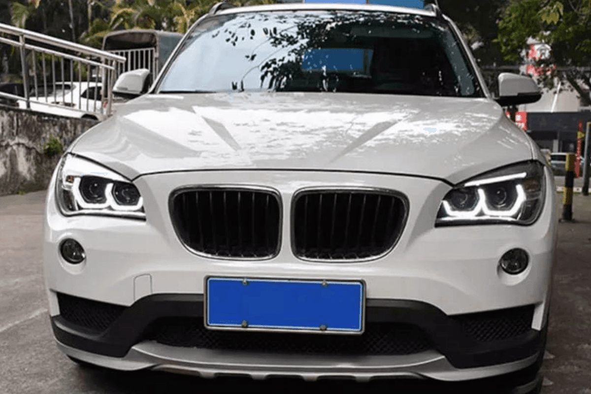BMW E84 X1 headlights with modern angel eye and HID bi-xenon bulbs, designed for 2010-2015 K2 Industries headlight upgrade