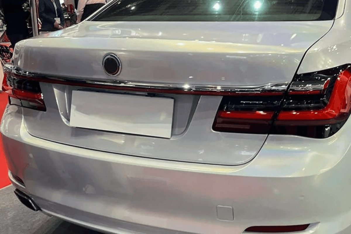 BMW F02 7 Series red LED tail lights by K2 Industries, luxury beam style, for 2008-2015 model, shown installed on vehicle.