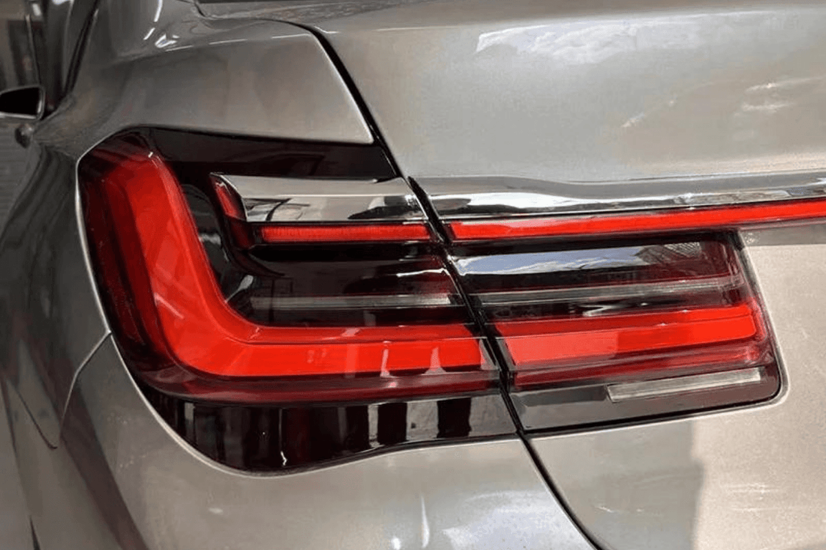 BMW F02 7 Series red LED luxury beam style tail lights by K2 Industries, showing close-up of sleek, modern tail light design.