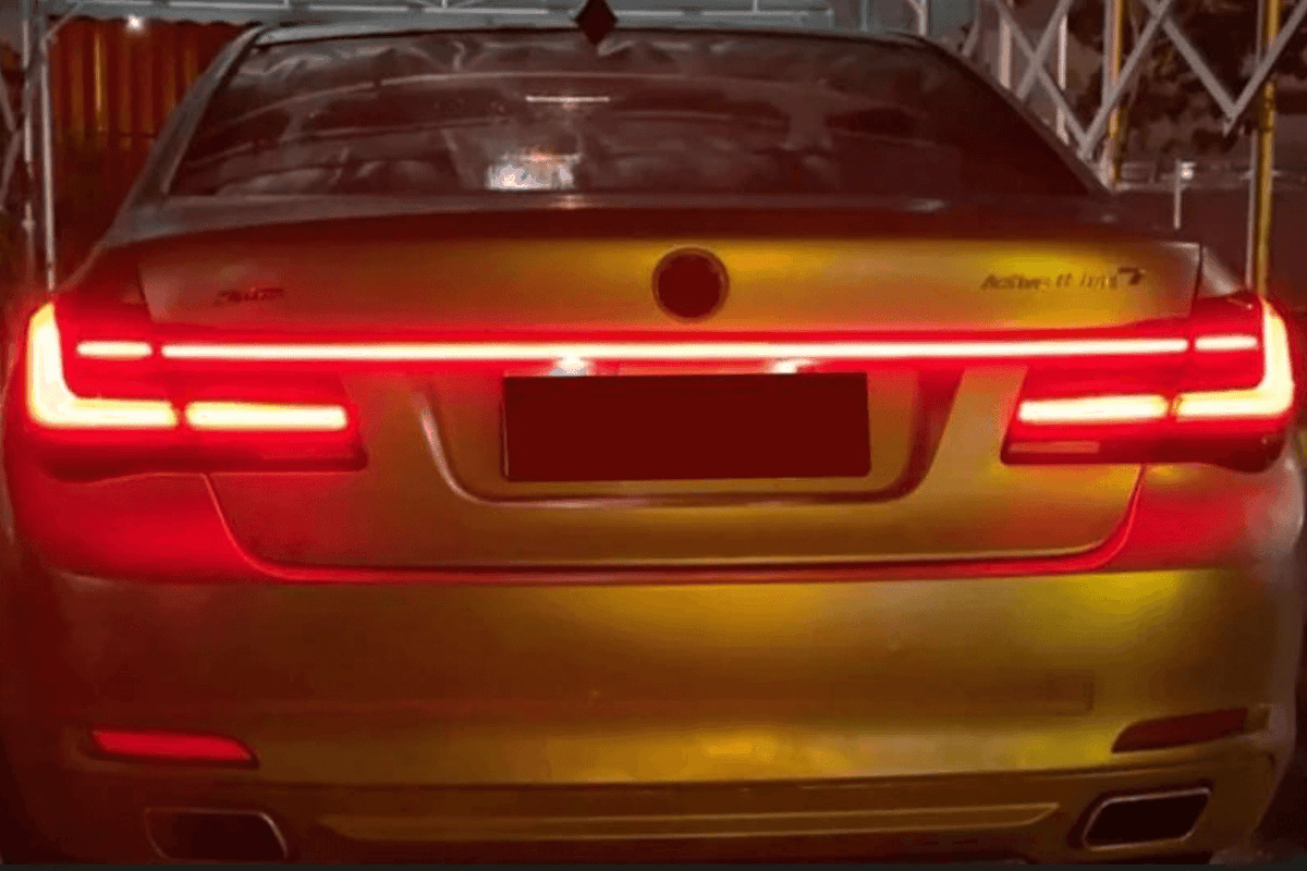 BMW F02 7 Series red LED tail lights by K2 Industries, featuring luxury beam style design for 2008-2015 models.