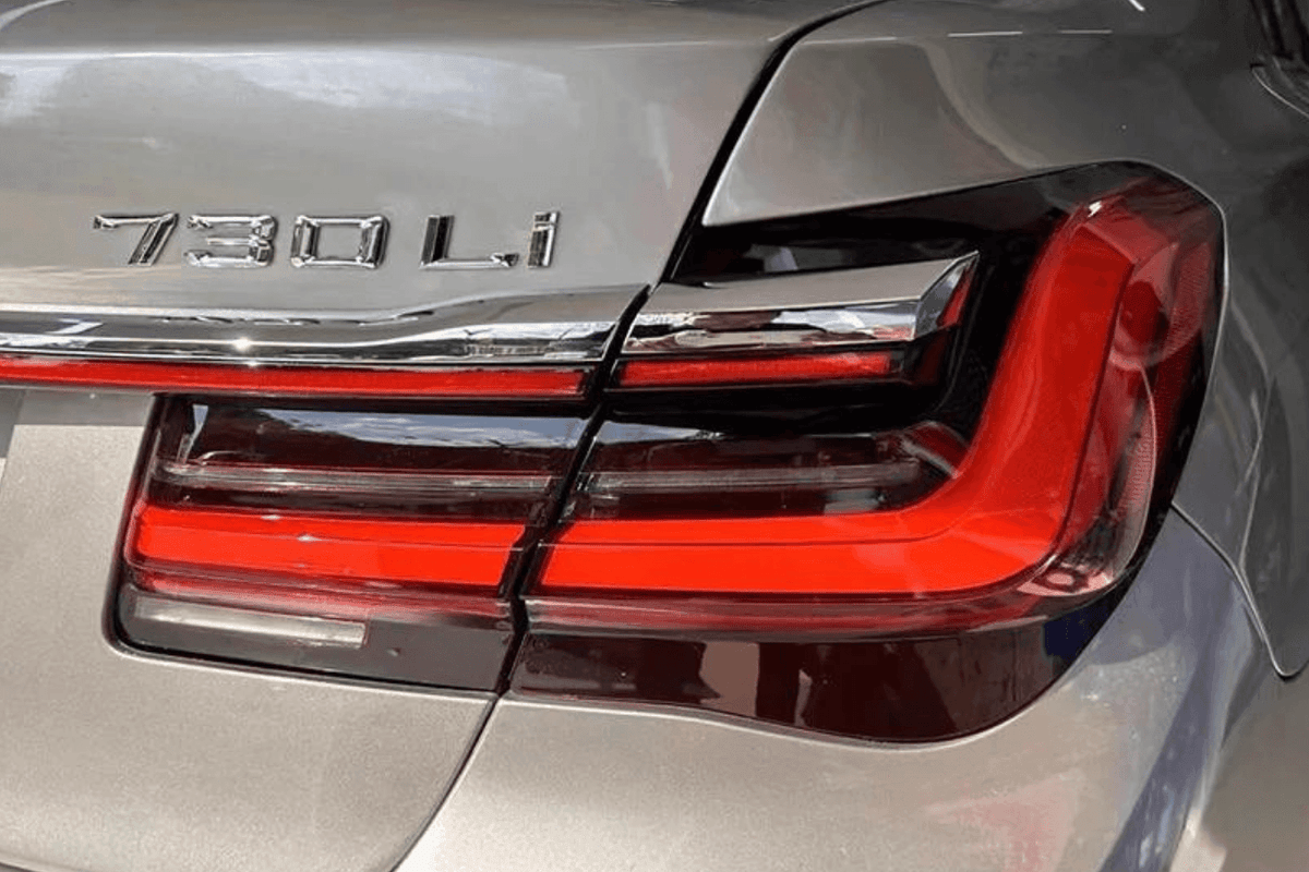 BMW F02 7 Series red LED tail lights by K2 Industries, showcasing luxury beam style design for 2008-2015 models.