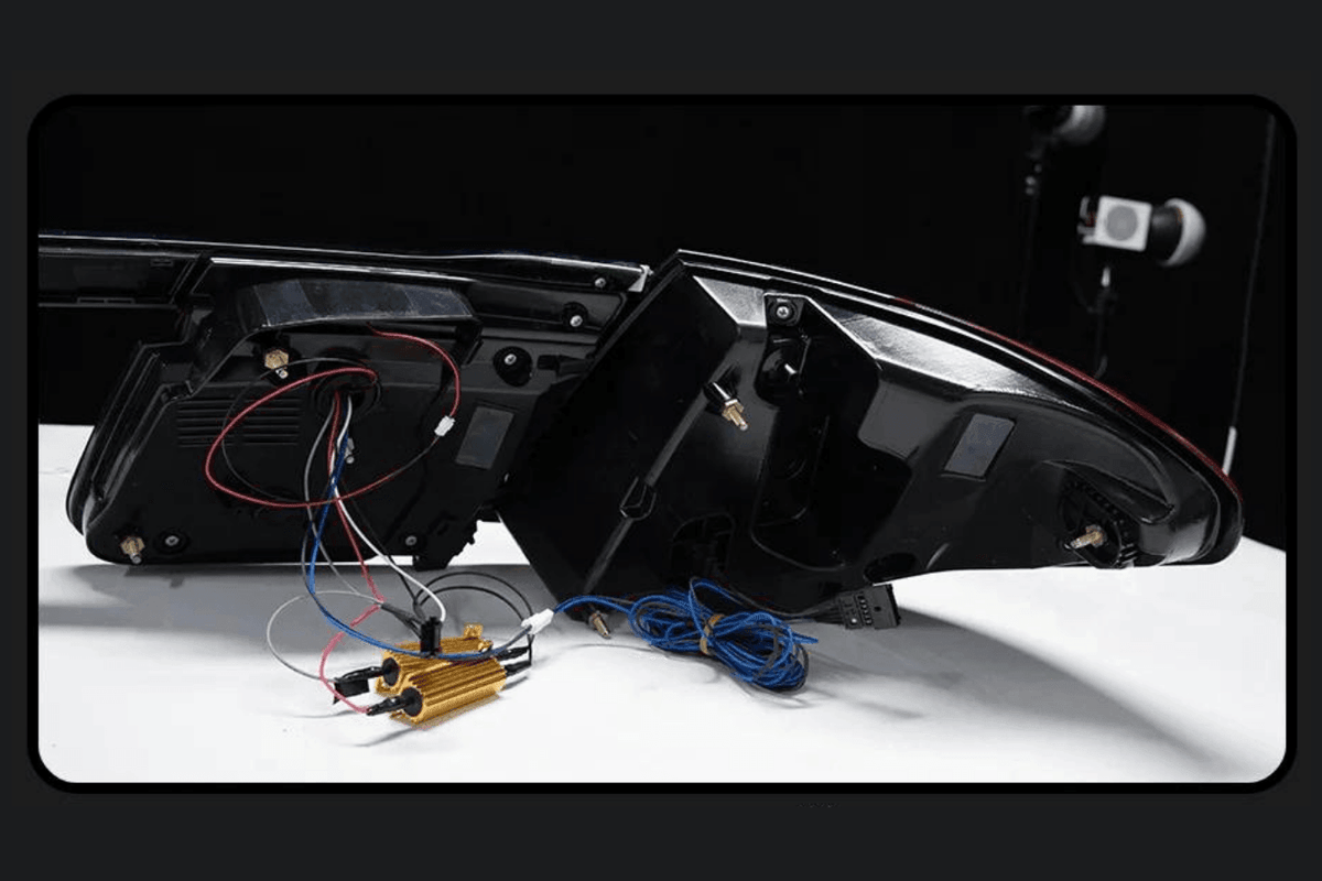 BMW F02 7 Series red LED tail lights by K2 Industries, luxury beam style, for 2008-2015 model with clear lens and LED lighting.