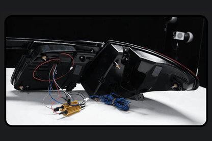 BMW F02 7 Series red LED tail lights by K2 Industries, luxury beam style, for 2008-2015 model with clear lens and LED lighting.