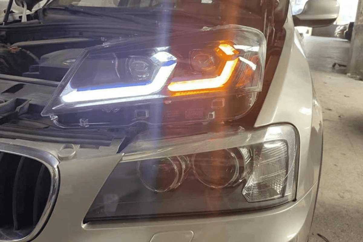 BMW F25 X3 pre-LCI modern style LED headlights by K2 Industries, showcasing sleek design for model years 2010-2013.
