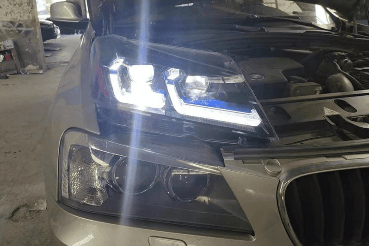 BMW F25 X3 2010-2013 modern style LED headlights by K2 Industries, showing sleek headlight design with LED lighting elements.