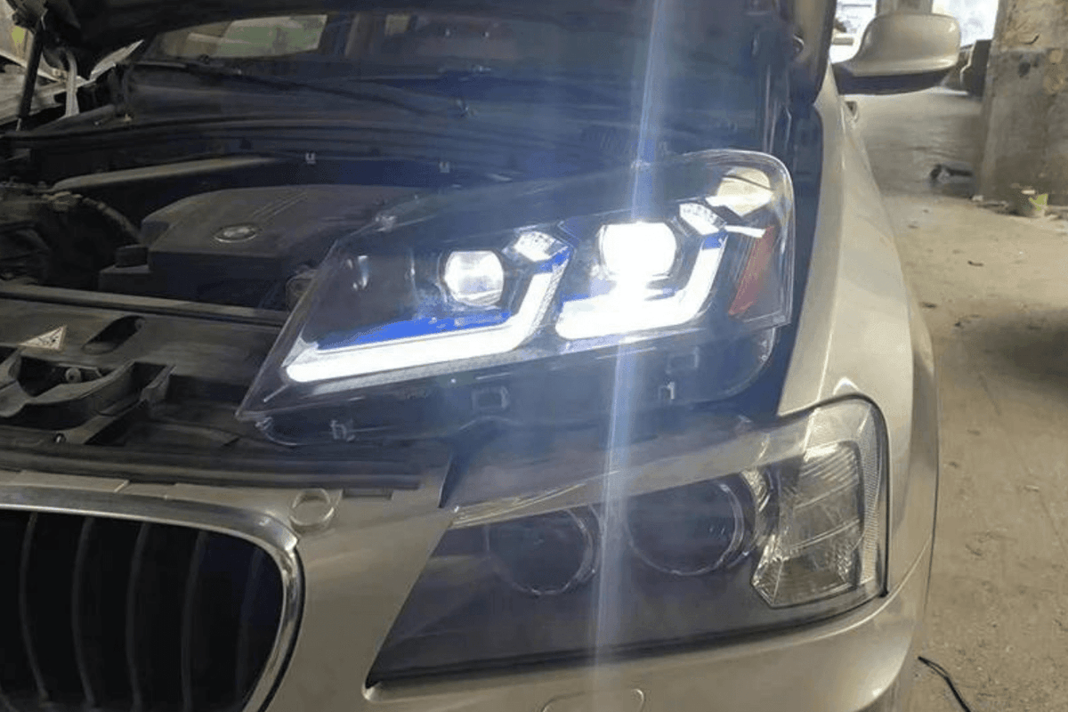 BMW F25 X3 2010-2013 Modern Style LED Headlights by K2 Industries, showcasing sleek design and bright LED lighting.