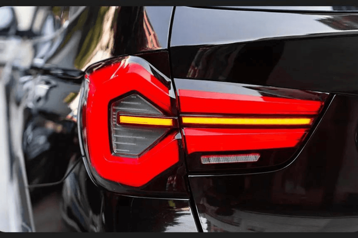 BMW F25 X3 LED tail lights by K2 Industries, next-gen LCI style, installed on 2010-2017 BMW X3 SUV, showing rear lighting design.