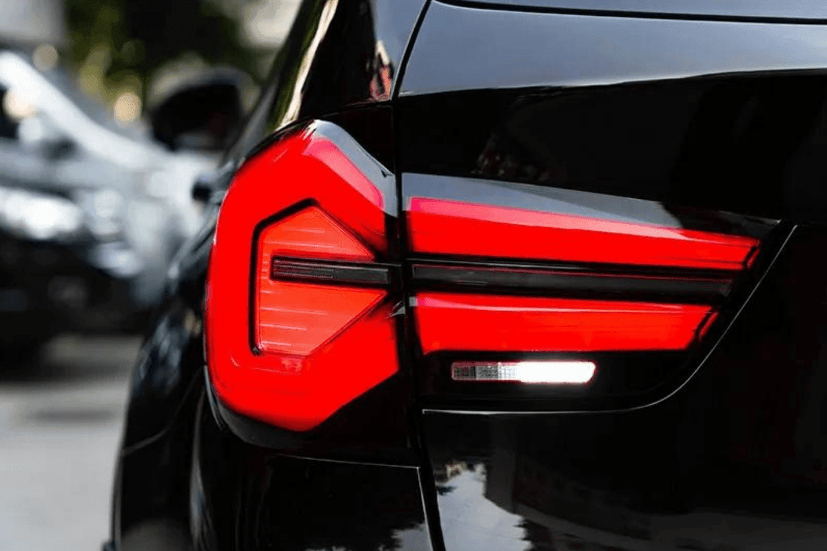 BMW F25 X3 LED tail lights by K2 Industries, next-gen LCI style, rear view showing sleek red and clear lenses for 2010-2017.
