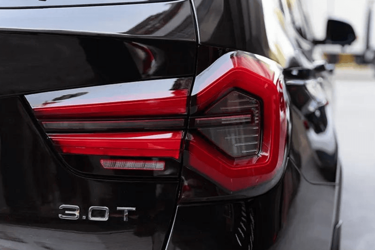 BMW F25 X3 2010-2017 LED tail lights by K2 Industries, showcasing sleek, modern design with bright LED illumination.