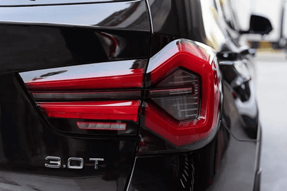 BMW F25 X3 2010-2017 LED tail lights by K2 Industries, showcasing sleek, modern design with bright LED illumination.