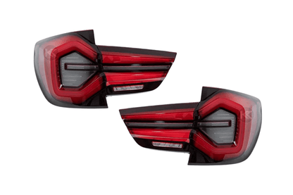 BMW F25 X3 LED Tail Lights by K2 Industries, next-gen LCI style, for 2010-2017 models, shown with illuminated red and clear lenses.