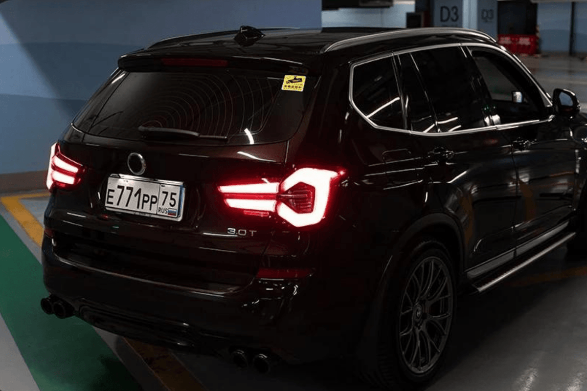 BMW F25 X3 LED tail lights by K2 Industries, rear view showing sleek LCI style design for 2010-2017 models.