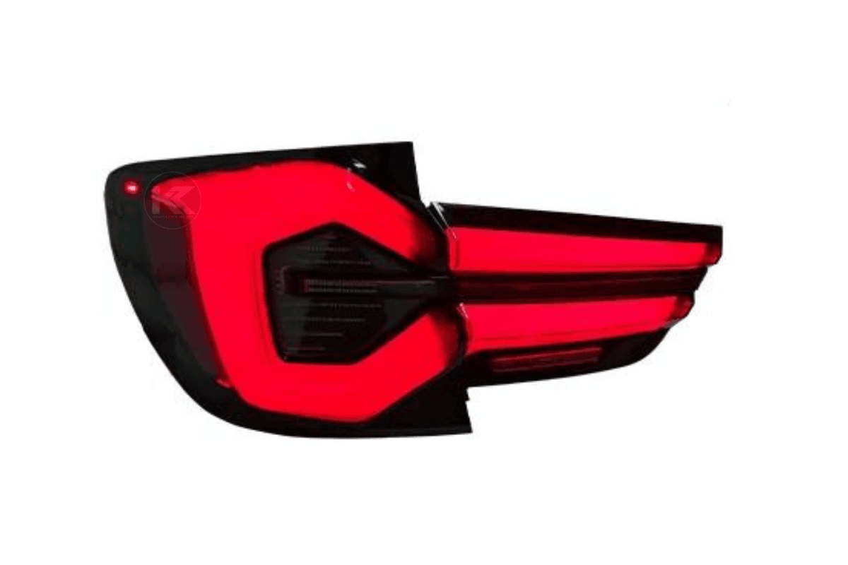 BMW F25 X3 2010-2017 LED tail lights by K2 Industries, showing sleek design and bright illumination on the vehicle's rear.