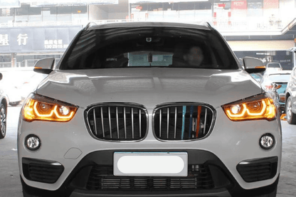 BMW F48 X1 modern style headlights upgrade by K2 Industries, showing sleek daytime running lights and detailed headlight design.