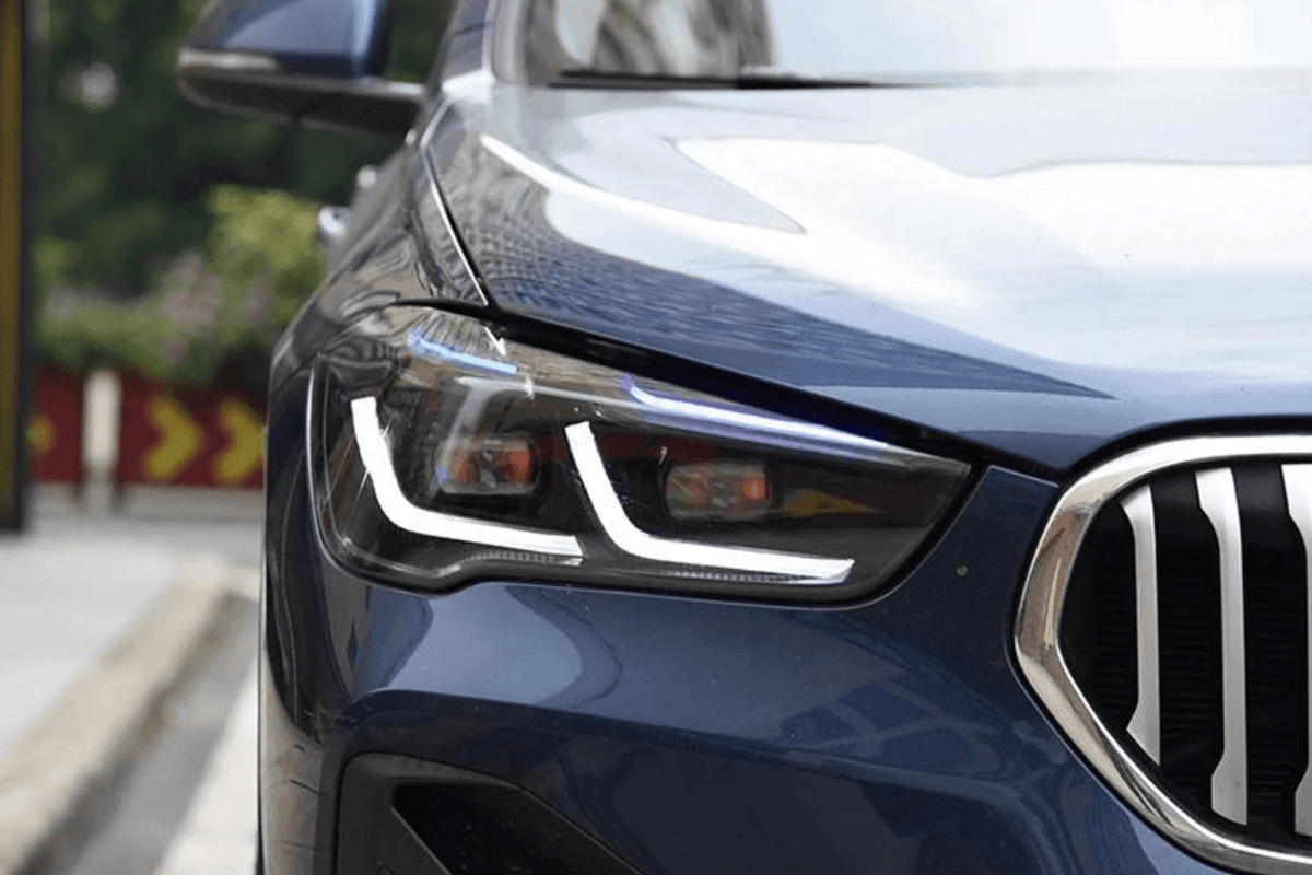 BMW F48 X1 modernized headlight upgrade by K2 Industries, 2016-2020, showcasing sleek headlight design with LED elements.