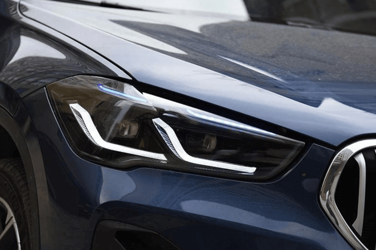 BMW F48 X1 headlight upgrade by K2 Industries, modernized headlights for 2016-2020 model, showcasing sleek design and advanced lighting.