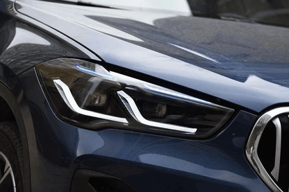 BMW F48 X1 headlight upgrade by K2 Industries, modernized headlights for 2016-2020 model, showcasing sleek design and advanced lighting.