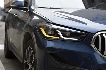BMW F48 X1 modernized headlights by K2 Industries, 2016-2020, featuring sleek design and advanced lighting elements.