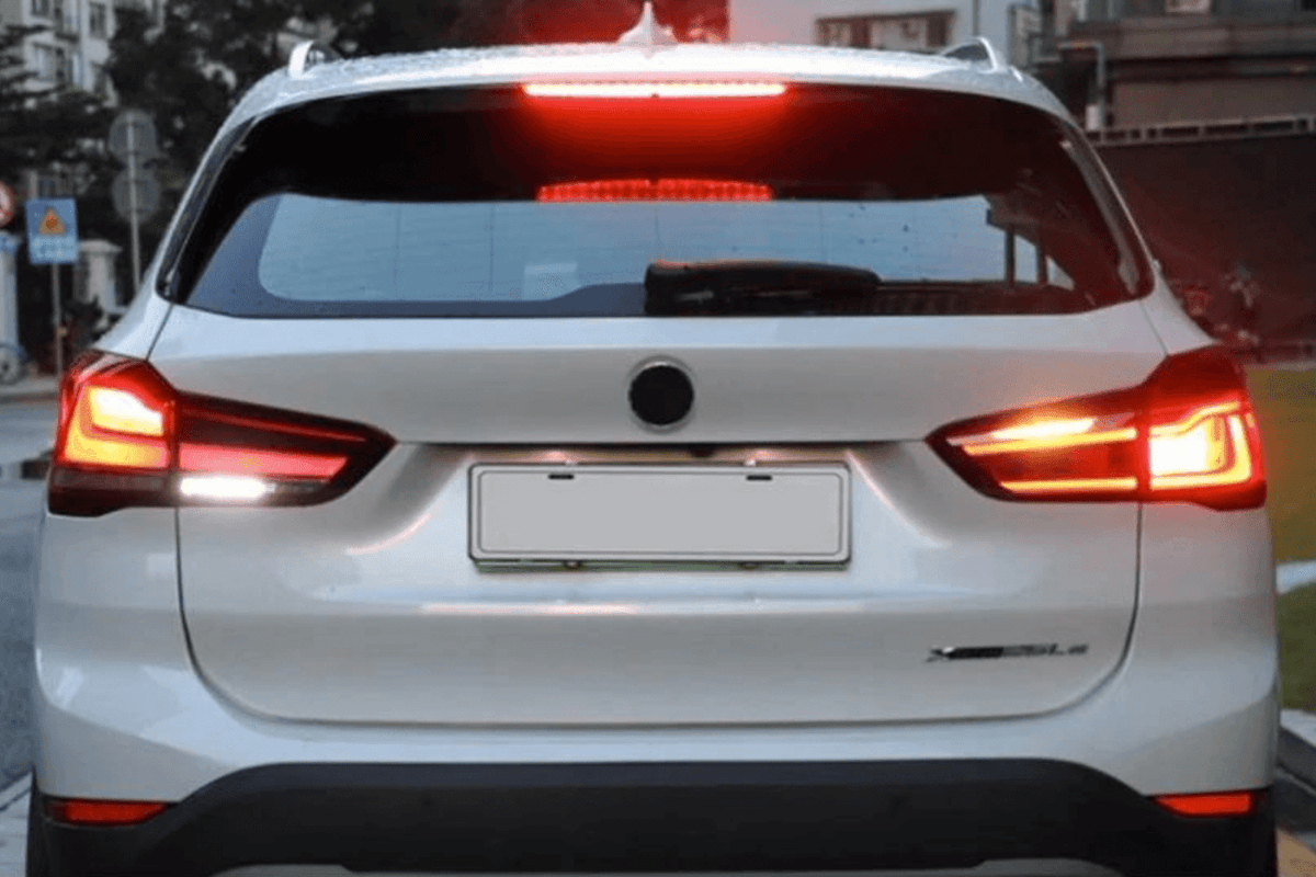 BMW F48 X1 tail light update with red and smoked variants, featuring sleek design and modern LED lighting from K2 Industries.
