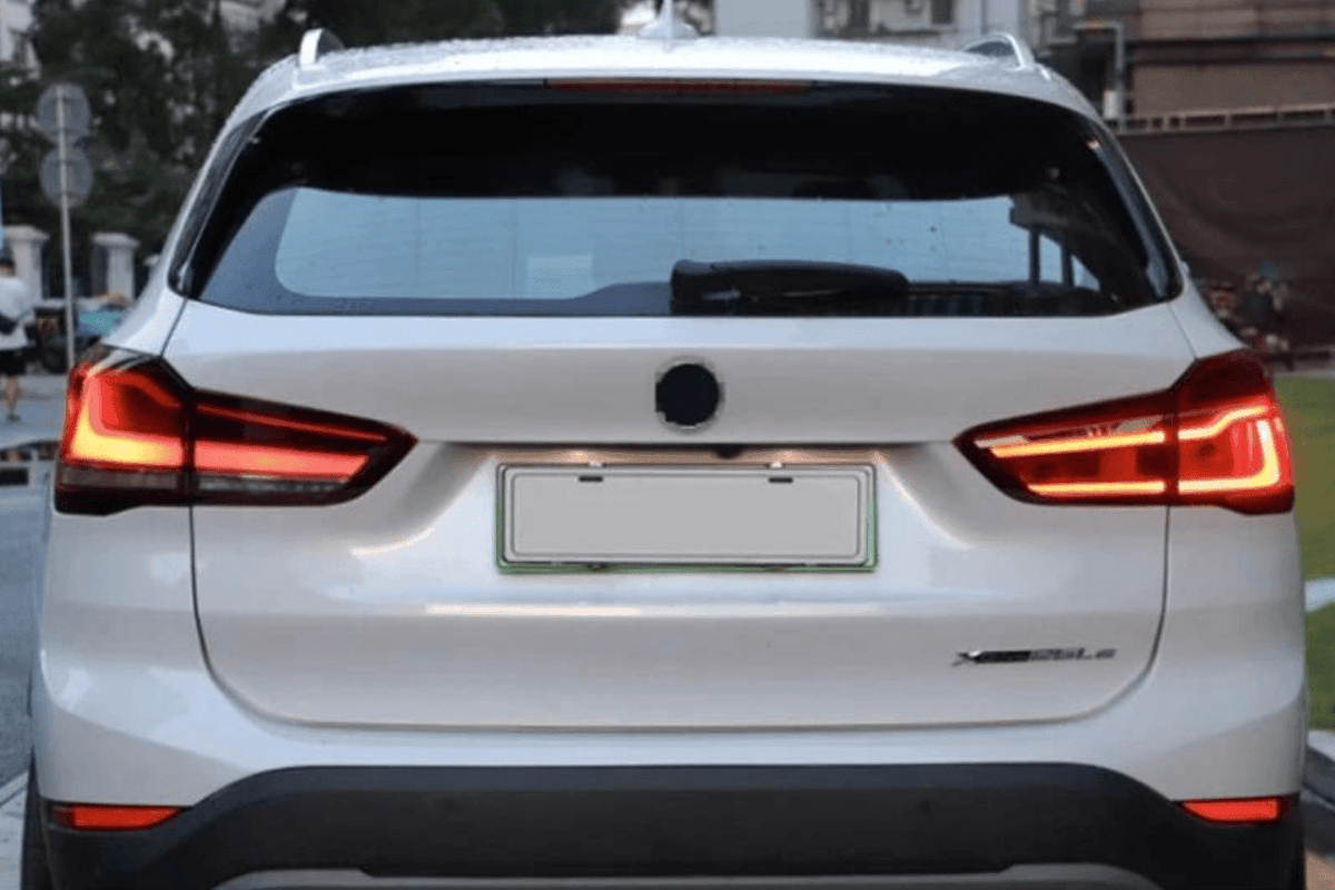 BMW F48 X1 tail light update by K2 Industries, red and smoked variants, for models 2016 to 2022, showing close-up of tail light design.