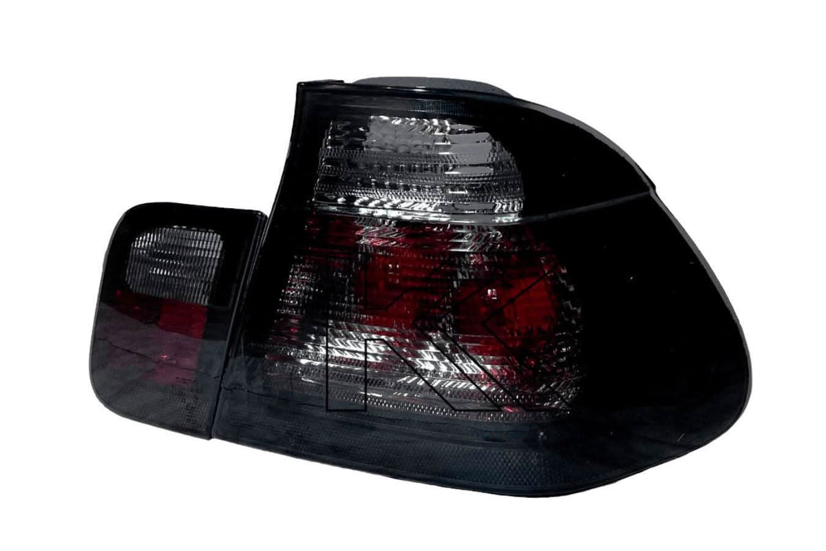 Black lens tail lights for BMW Series 3 E46 sedan from 1998-2001 by K2 Industries, showing the rear view with illuminated elements.