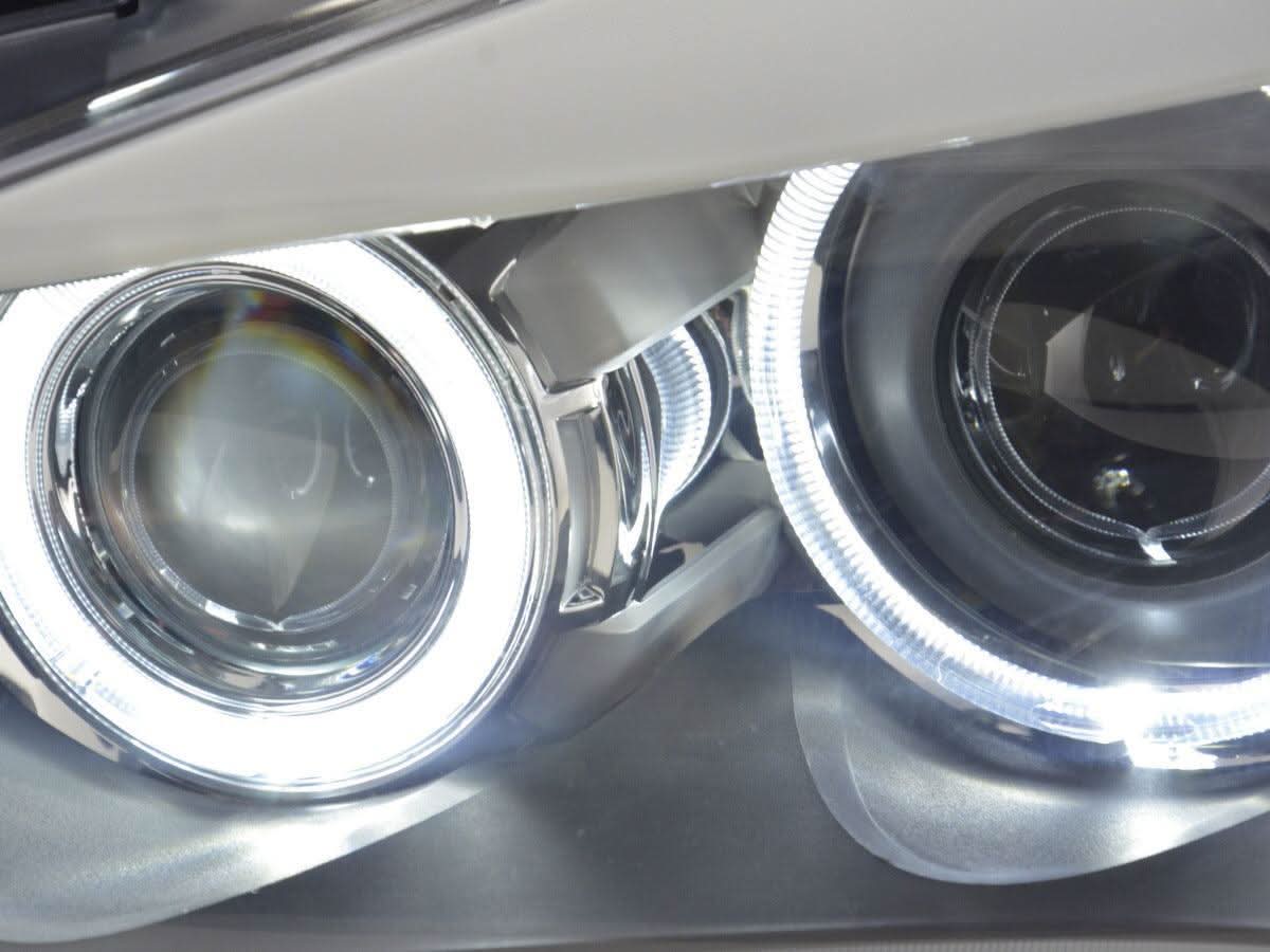 BMW X1 E84 LED Angel Eye headlights by K2 Industries, for 2009-2012 model, featuring bright illuminated angel eyes and clear lens.