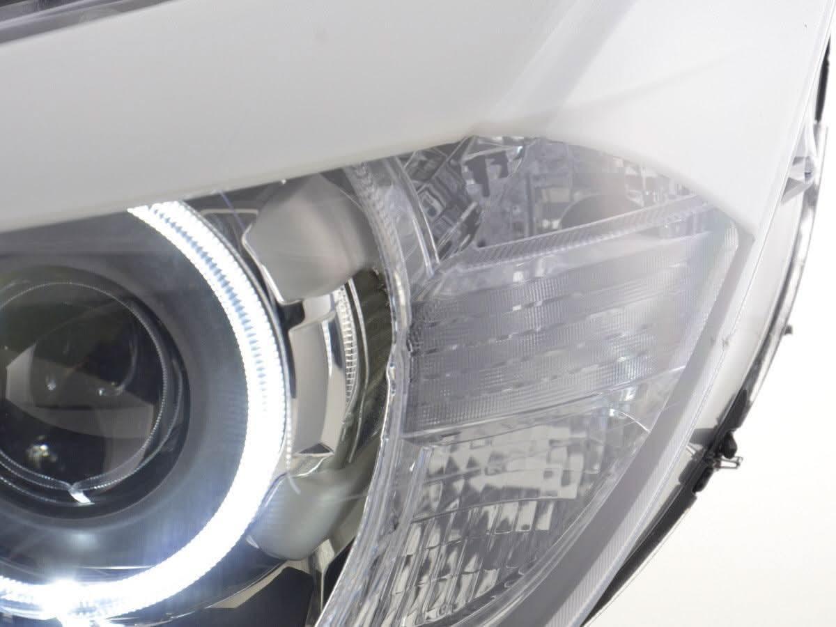 BMW X1 E84 LED Angel Eye headlights by K2 Industries, 2009-2012, showing close-up of the headlight with illuminated angel eye rings.