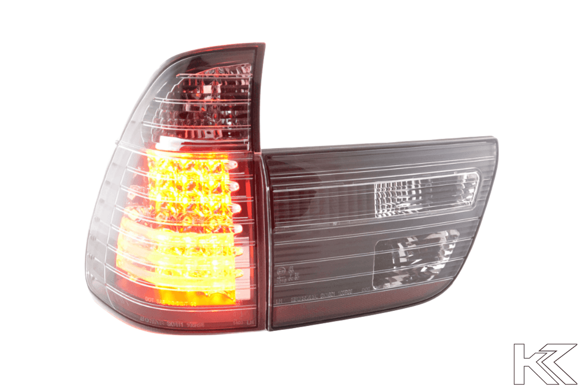 BMW X5 E53 black and clear LED tail lights by K2 Industries, designed for 1998-2002 models, showing close-up of tail light assembly.