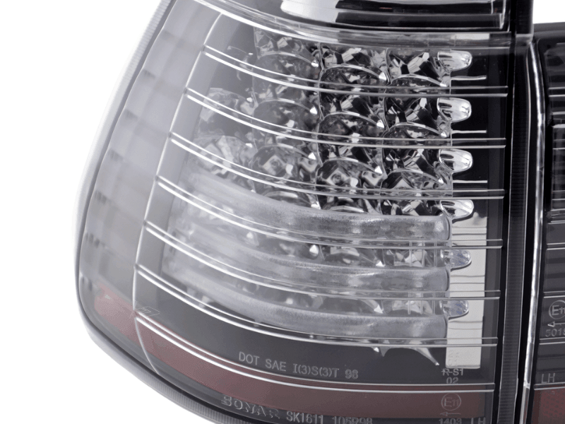 BMW X5 E53 black and clear LED tail lights by K2 Industries for 1998-2002 model, showing close-up of rear lighting details.
