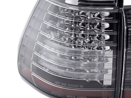 BMW X5 E53 black and clear LED tail lights by K2 Industries for 1998-2002 model, showing close-up of rear lighting details.