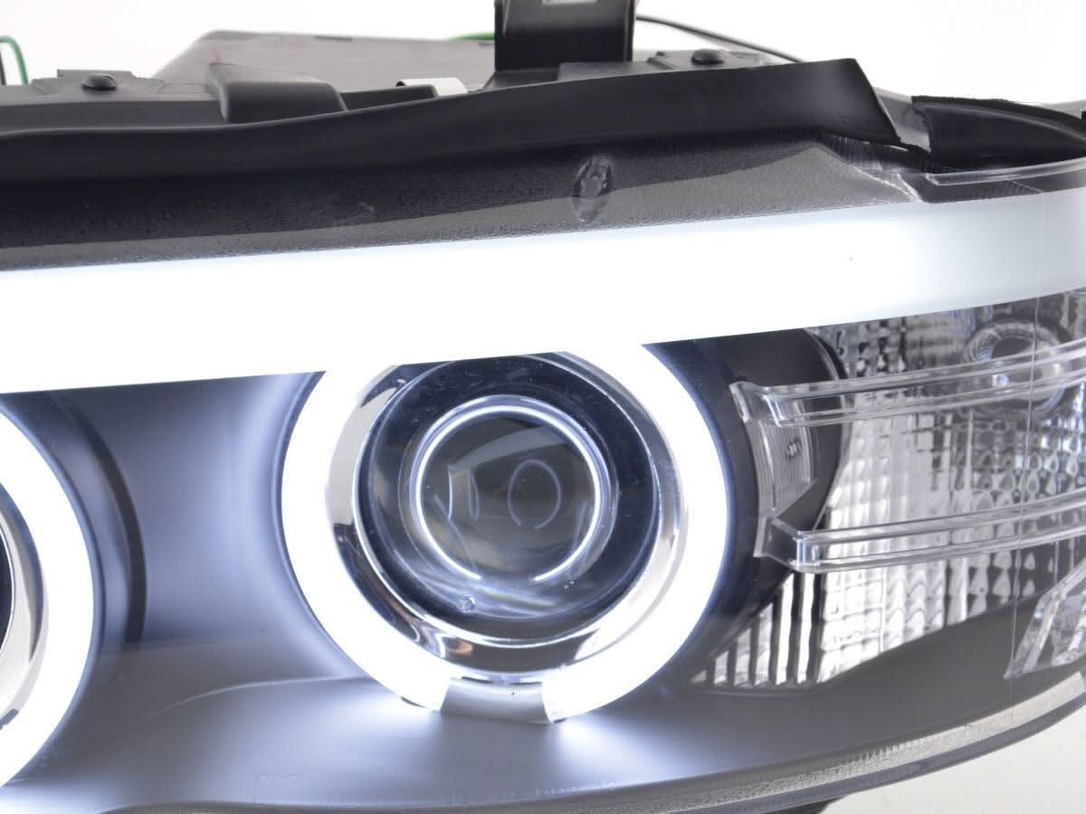 BMW X5 E53 headlights with black angel eyes and LED accents, compatible with 2003-2006 models by K2 Industries