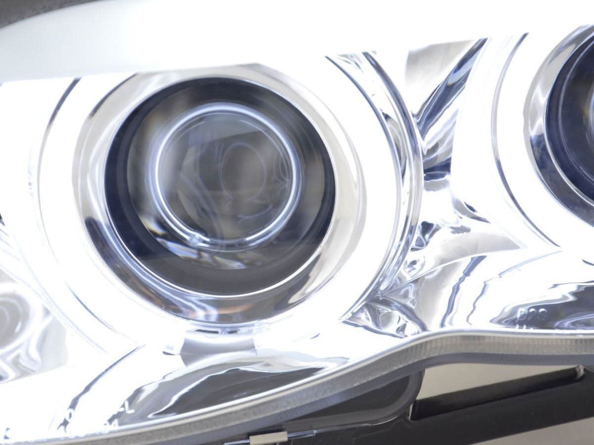 BMW X5 E53 CCFL Chrome Angel Eyes LED Headlights by K2 Industries, showing sleek chrome accents and bright LED rings.