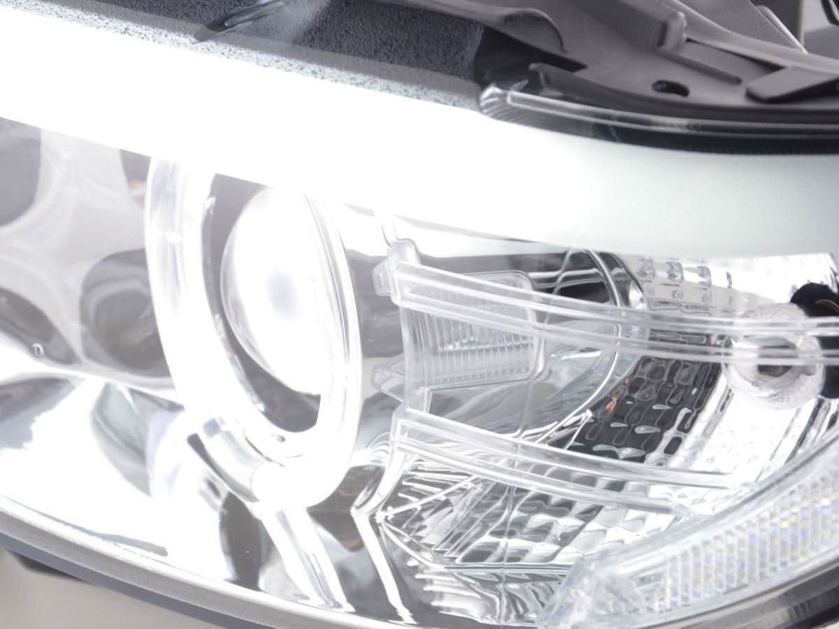 BMW X5 E53 chrome angel eye LED headlights by K2 Industries, showing sleek chrome finish and bright LED rings for 2003-2006 models.