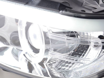 BMW X5 E53 chrome angel eye LED headlights by K2 Industries, showing sleek chrome finish and bright LED rings for 2003-2006 models.
