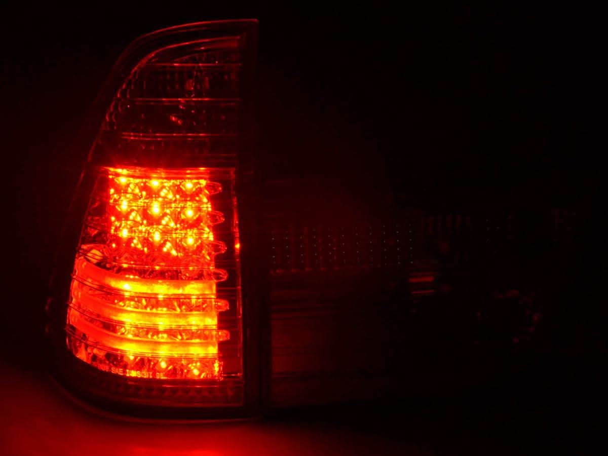 BMW X5 E53 red LED tail lights set by K2 Industries, for 1998-2002 models, showing the sleek rear lighting design.