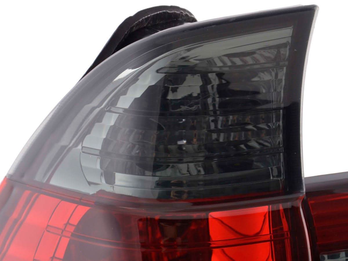 BMW X5 E53 red smoked tail lights set by K2 Industries, rear view showing red and smoked lenses for 1998-2003 models.