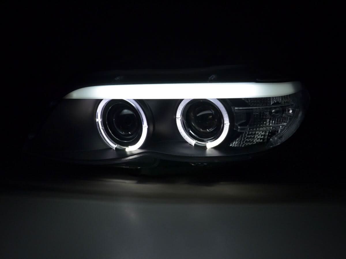 BMW X5 E53 headlights with black angel eye LED rings, Xenon bulbs, for 2003-2006 model by K2 Industries.