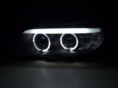 BMW X5 E53 headlights with black angel eye LED rings, Xenon bulbs, for 2003-2006 model by K2 Industries.