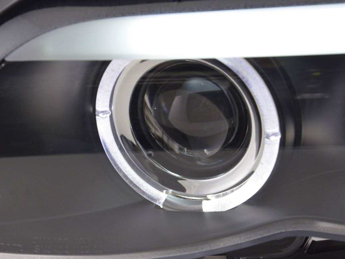 BMW X5 E53 headlights with black angel eye LED rings, Xenon lights, for 2003-2006, by K2 Industries.